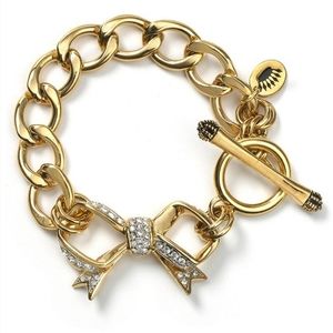 Beautiful Juicy Couture Golden Bow bracelet